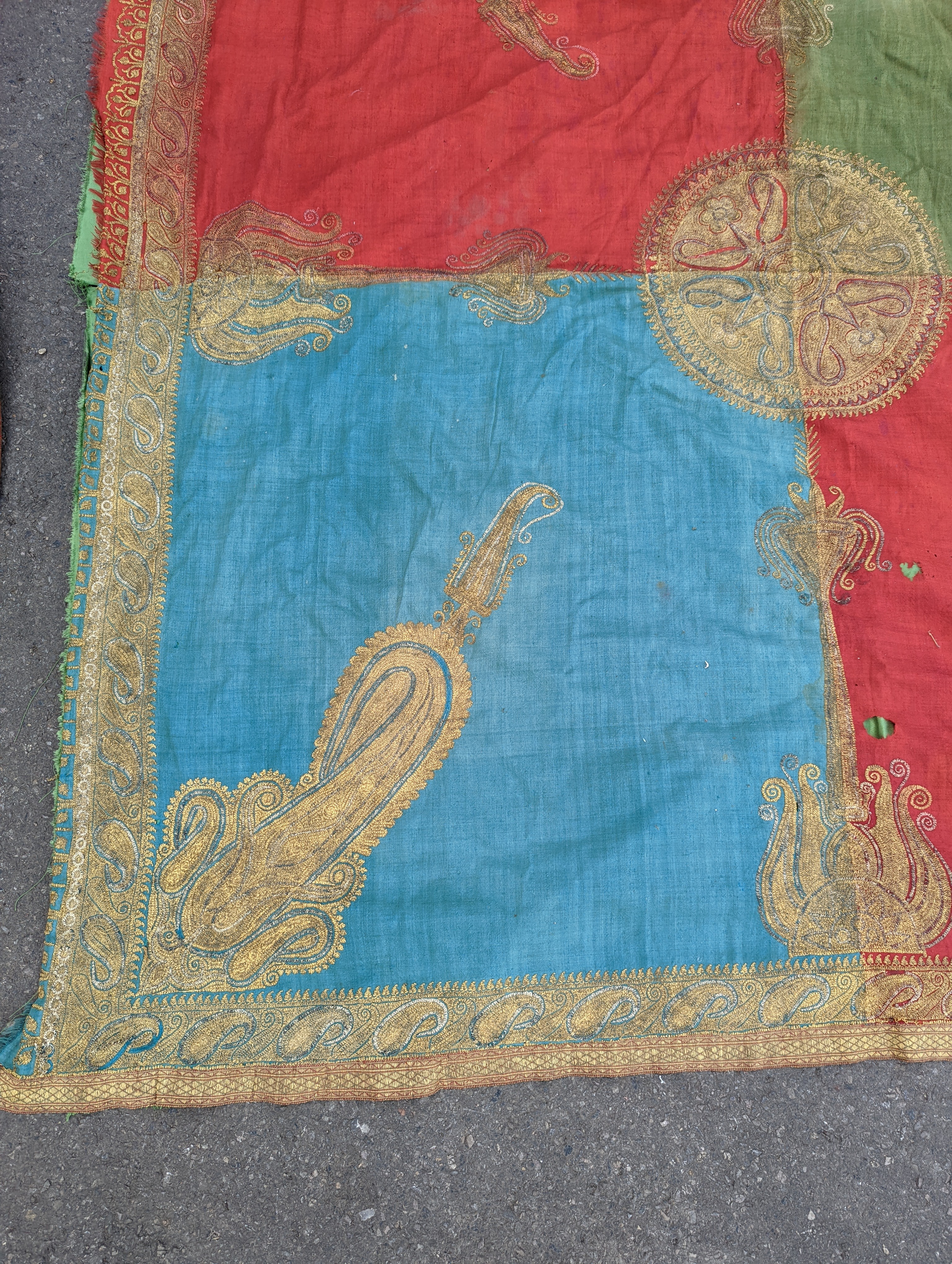 A silkwork shawl (a.f.) 270 x 140cm and an Indian embroidered cloth, 185 x180cm